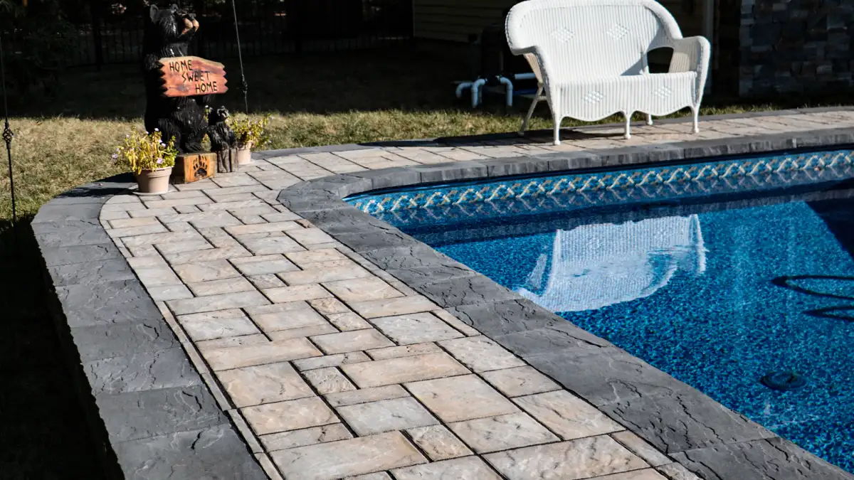 LED landscape light fixture illuminating a garden path with warm white output