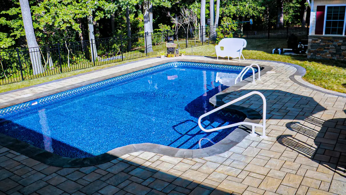 Residential patio with herringbone paver pattern