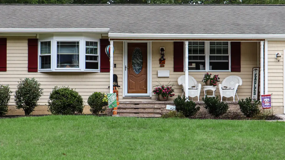 Large paver patio and retaining wall on sloped property